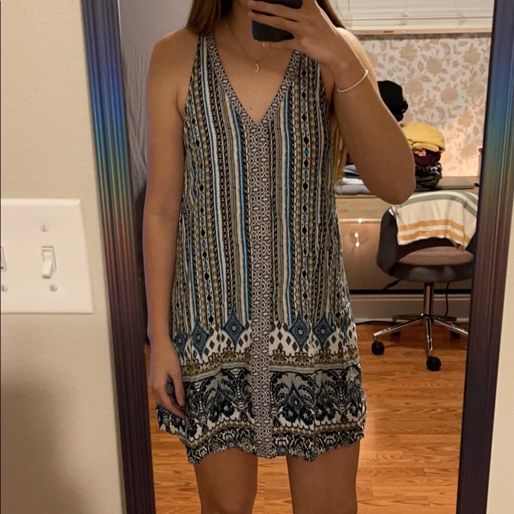 Patterned halter dress with v neck and open back